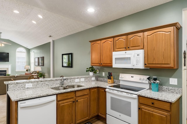 4124 Aumbrey Ct, New Albany, OH 43054 - kitchen featuring white appliances, a peninsula, open floor plan, light stone counters, and brown cabinets