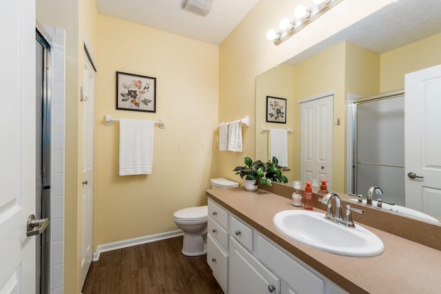 4124 Aumbrey Ct, New Albany, OH 43054 - bathroom featuring vanity, wood finished floors, and a shower with shower door