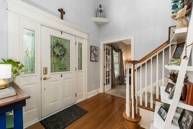 1828 Bradford Cir, Newark, OH 43055 - foyer entrance featuring dark wood-style floors and stairs