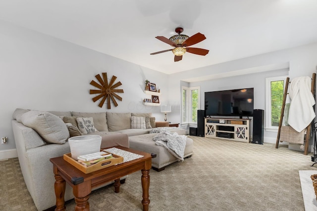 1828 Bradford Cir, Newark, OH 43055 - carpeted living room featuring ceiling fan and plenty of natural light
