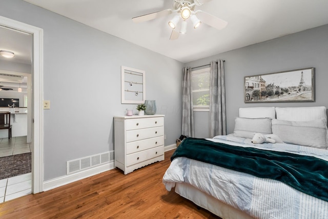 1828 Bradford Cir, Newark, OH 43055 - bedroom featuring wood finished floors and a ceiling fan