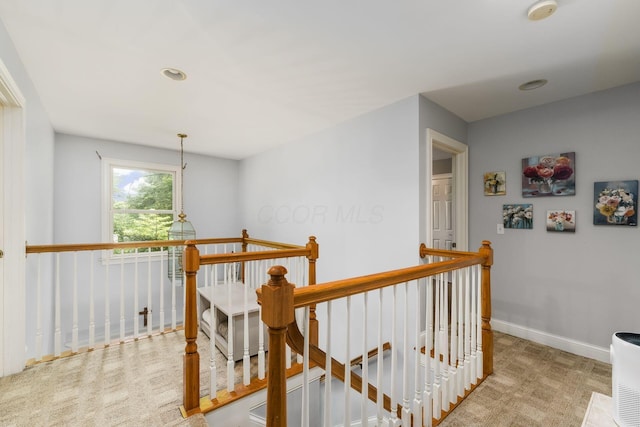 1828 Bradford Cir, Newark, OH 43055 - hall with an upstairs landing and carpet flooring