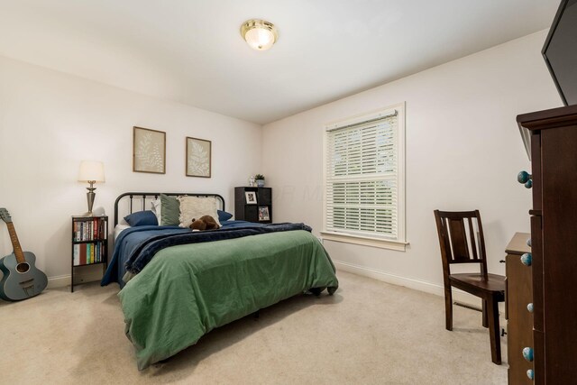 1828 Bradford Cir, Newark, OH 43055 - bedroom featuring light carpet and baseboards