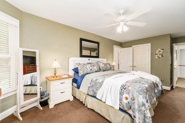 1828 Bradford Cir, Newark, OH 43055 - bedroom featuring dark colored carpet, a ceiling fan, and a closet