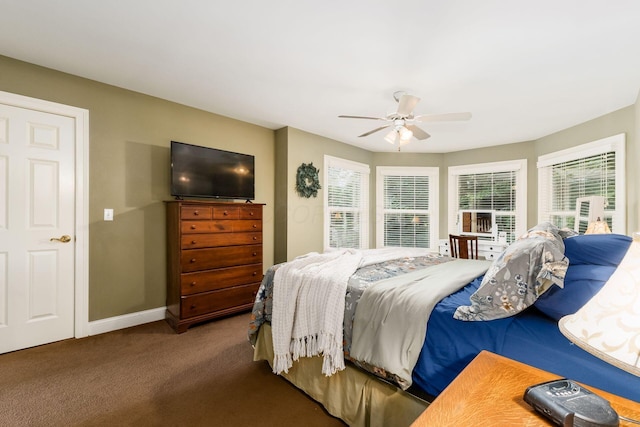 1828 Bradford Cir, Newark, OH 43055 - carpeted bedroom with ceiling fan and baseboards
