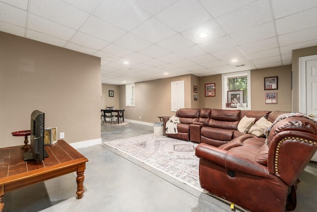 1828 Bradford Cir, Newark, OH 43055 - living area with finished concrete floors, a paneled ceiling, and recessed lighting