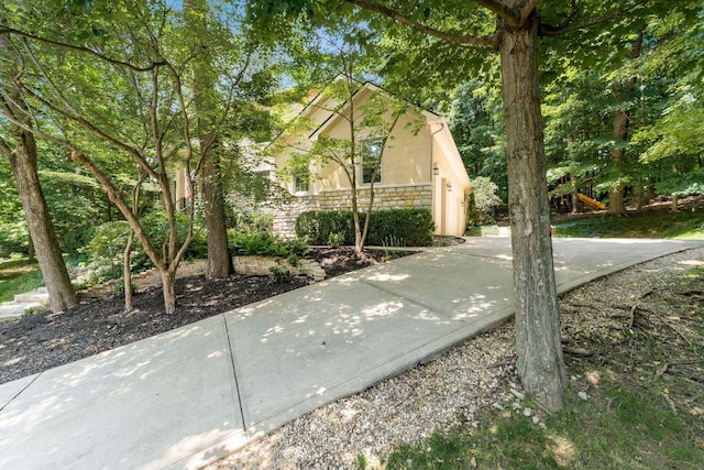 1828 Bradford Cir, Newark, OH 43055 - view of property exterior with stone siding and stucco siding