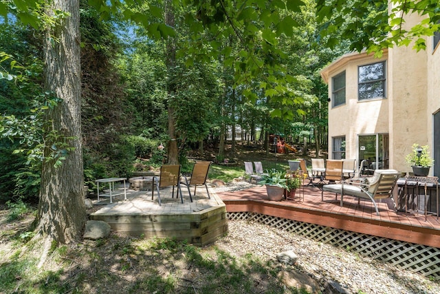 1828 Bradford Cir, Newark, OH 43055 - view of patio / terrace featuring a fire pit and a deck