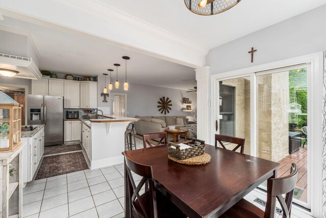 1828 Bradford Cir, Newark, OH 43055 - dining area with light tile patterned floors and a chandelier