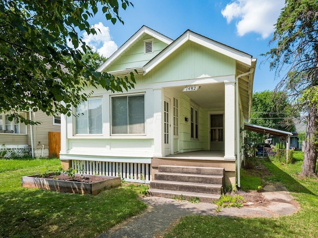 1482 Briarwood Ave, Columbus, OH 43211 - view of front of house featuring a porch and a front yard