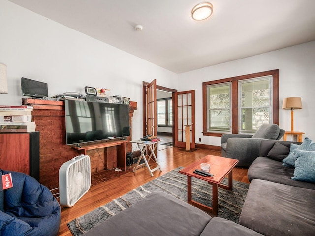 1482 Briarwood Ave, Columbus, OH 43211 - living room featuring wood finished floors and french doors
