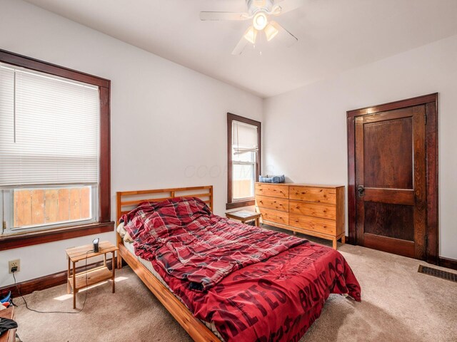 1482 Briarwood Ave, Columbus, OH 43211 - bedroom with carpet and ceiling fan