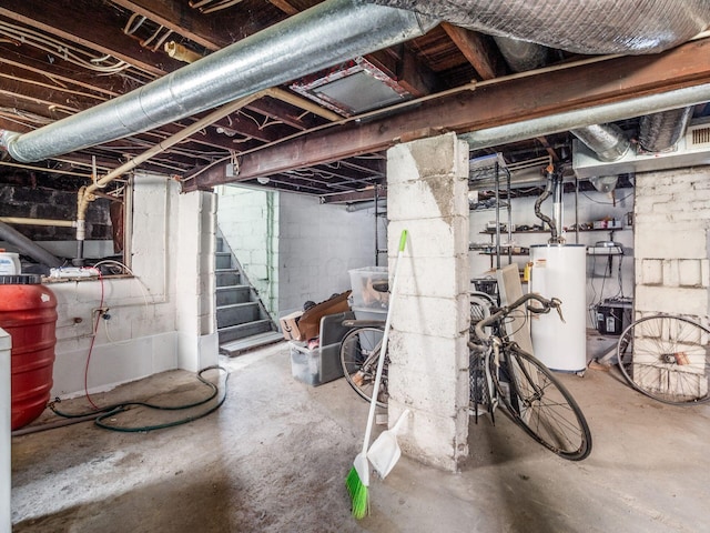 1482 Briarwood Ave, Columbus, OH 43211 - unfinished basement featuring gas water heater and stairs