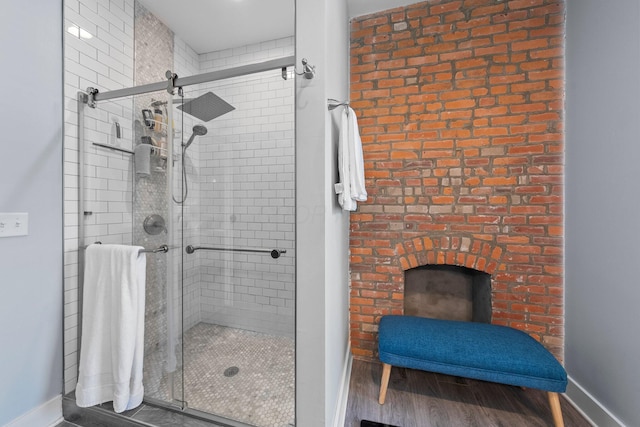 144 Wilson Ave, Columbus, OH 43205 - bathroom featuring a stall shower and wood finished floors