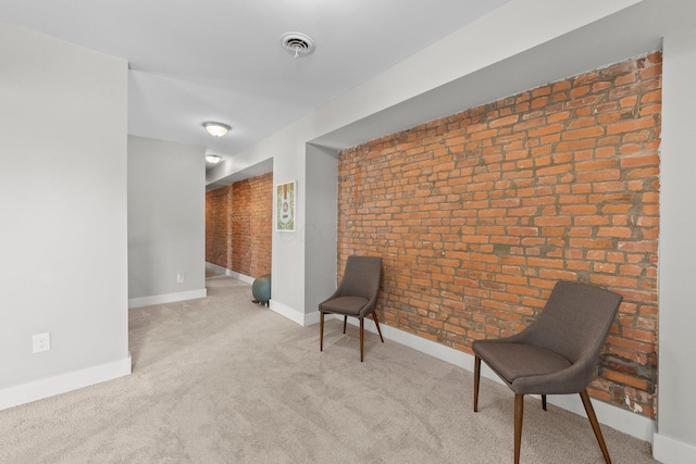 144 Wilson Ave, Columbus, OH 43205 - unfurnished room featuring brick wall and carpet flooring