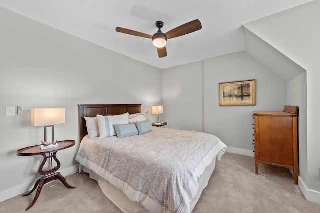 144 Wilson Ave, Columbus, OH 43205 - bedroom featuring light carpet, vaulted ceiling, and a ceiling fan