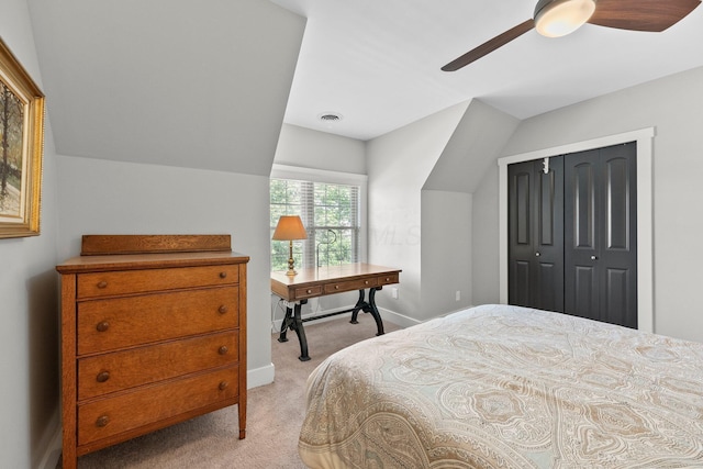 144 Wilson Ave, Columbus, OH 43205 - bedroom with light colored carpet, vaulted ceiling, a closet, and ceiling fan