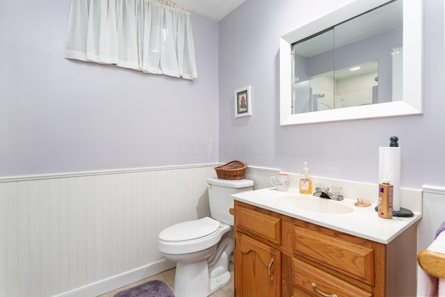 1374 Hanover Ct, Circleville, OH 43113 - bathroom with vanity, a wainscoted wall, and tile patterned flooring
