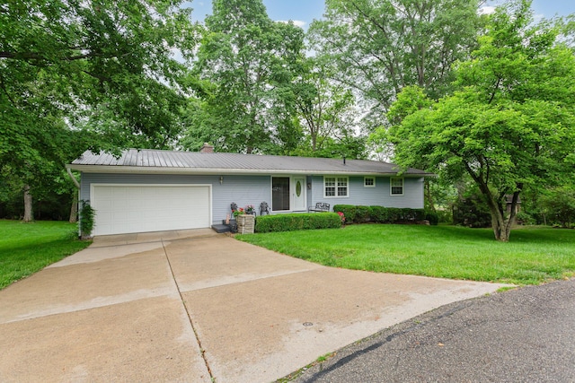 1374 Hanover Ct, Circleville, OH 43113 - ranch-style home with a garage, a chimney, a front lawn, and driveway