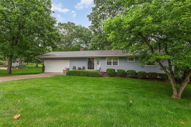 1374 Hanover Ct, Circleville, OH 43113 - single story home with a garage, concrete driveway, a front yard, a metal roof, and a chimney
