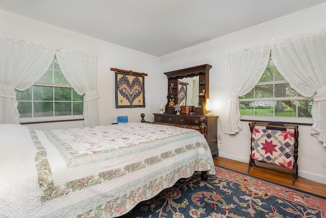 1374 Hanover Ct, Circleville, OH 43113 - bedroom with wood finished floors and baseboards