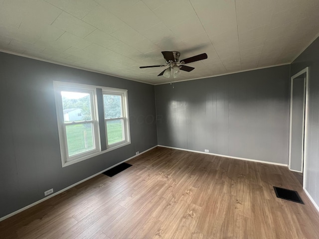 2135 Whitman Ave, Zanesville, OH 43701 - empty room featuring wood finished floors and a ceiling fan
