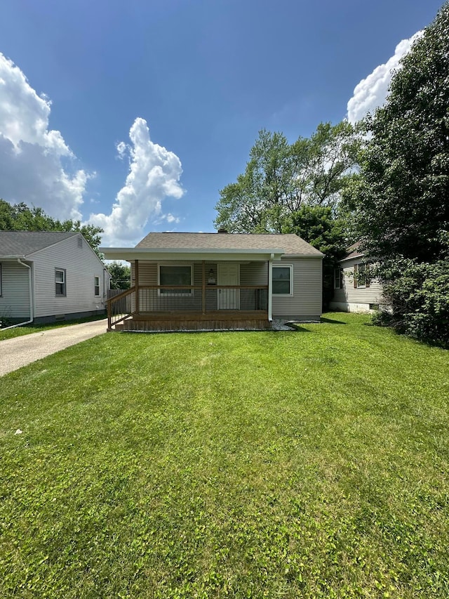 3203 Grasmere Ave, Columbus, OH 43224 - view of front facade with covered porch and a front yard