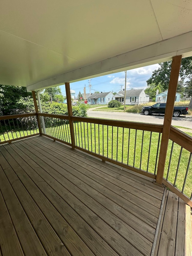 3203 Grasmere Ave, Columbus, OH 43224 - wooden deck with a lawn and a residential view