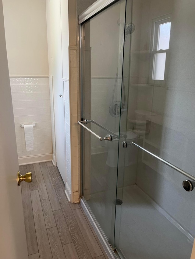 1848 Milden Rd, Columbus, OH 43221 - bathroom with a stall shower and wood finished floors