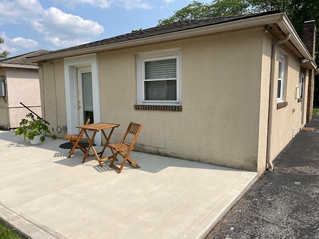 1848 Milden Rd, Columbus, OH 43221 - rear view of property with a patio and stucco siding