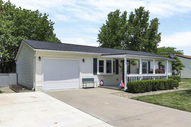 110 Creekview Dr, Baltimore, OH 43105 - single story home featuring a porch, an attached garage, and driveway