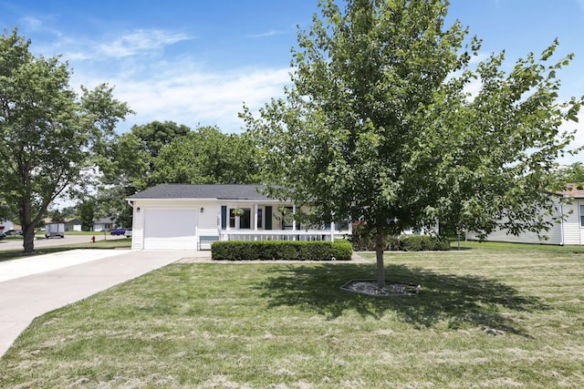 110 Creekview Dr, Baltimore, OH 43105 - view of front of house with driveway, an attached garage, a front lawn, and covered porch