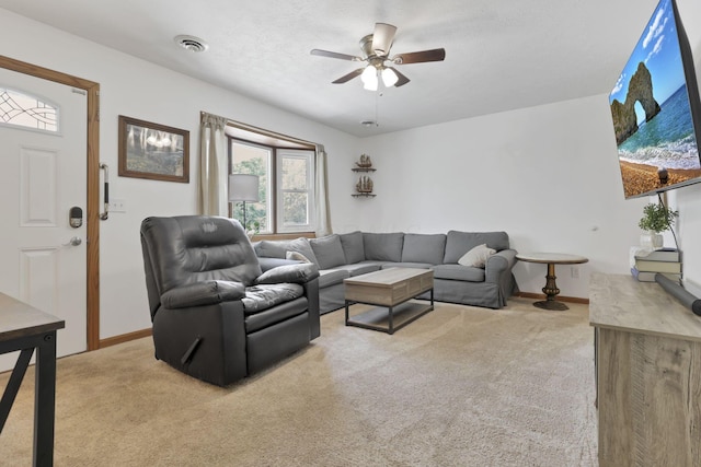 110 Creekview Dr, Baltimore, OH 43105 - living area with light colored carpet and a ceiling fan