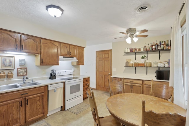110 Creekview Dr, Baltimore, OH 43105 - kitchen with white appliances, under cabinet range hood, light countertops, ceiling fan, and open shelves