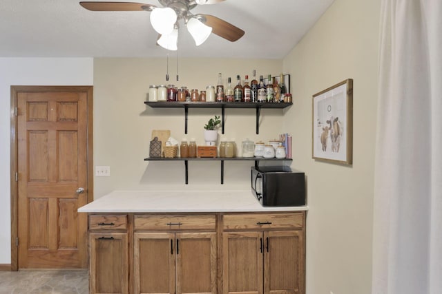 110 Creekview Dr, Baltimore, OH 43105 - indoor dry bar featuring ceiling fan and black microwave
