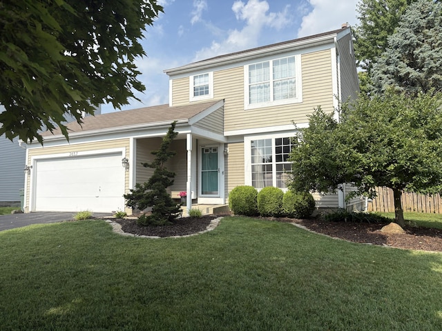 2657 Amberwick Pl, Hilliard, OH 43026 - view of front facade with an attached garage and asphalt driveway