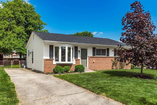 284 Blendon Rd, West Jefferson, OH 43162 - view of front of property with brick siding, entry steps, and concrete driveway