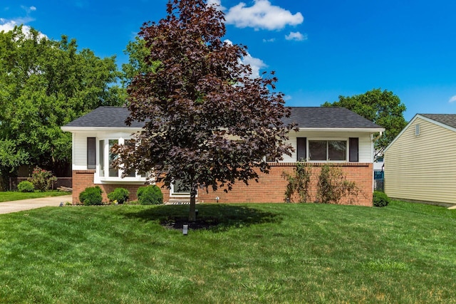 284 Blendon Rd, West Jefferson, OH 43162 - view of front of home featuring brick siding, a front lawn, and a shingled roof