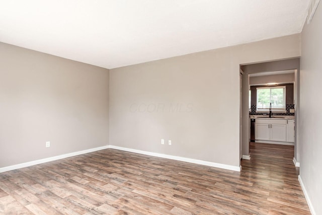284 Blendon Rd, West Jefferson, OH 43162 - spare room featuring wood finished floors and baseboards
