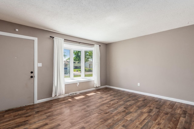 284 Blendon Rd, West Jefferson, OH 43162 - spare room with wood finished floors and a textured ceiling