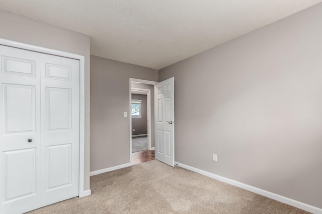 284 Blendon Rd, West Jefferson, OH 43162 - unfurnished bedroom featuring light colored carpet and a closet