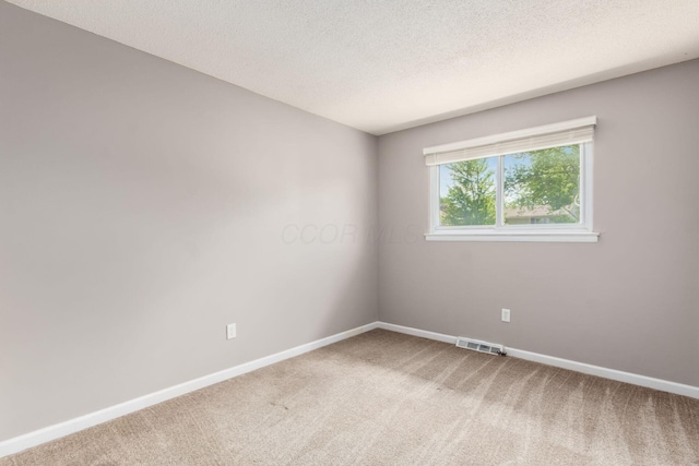 284 Blendon Rd, West Jefferson, OH 43162 - empty room featuring light carpet and a textured ceiling