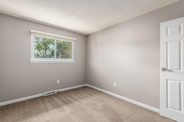 284 Blendon Rd, West Jefferson, OH 43162 - unfurnished room featuring light carpet and a textured ceiling