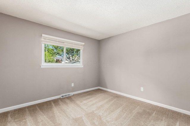 284 Blendon Rd, West Jefferson, OH 43162 - unfurnished room featuring carpet floors and a textured ceiling