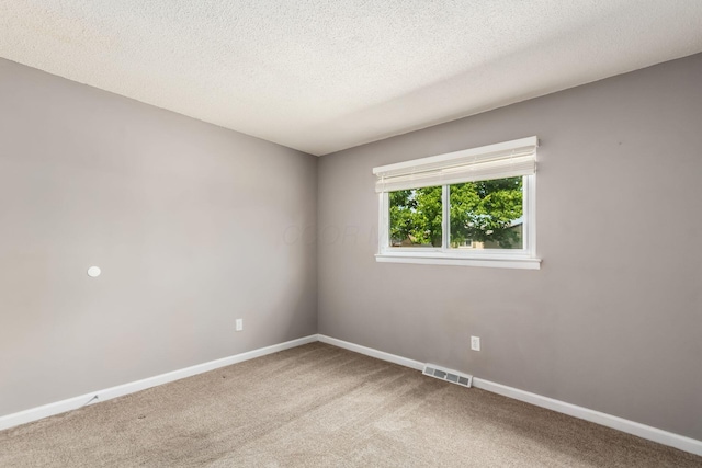 284 Blendon Rd, West Jefferson, OH 43162 - empty room featuring light colored carpet and a textured ceiling