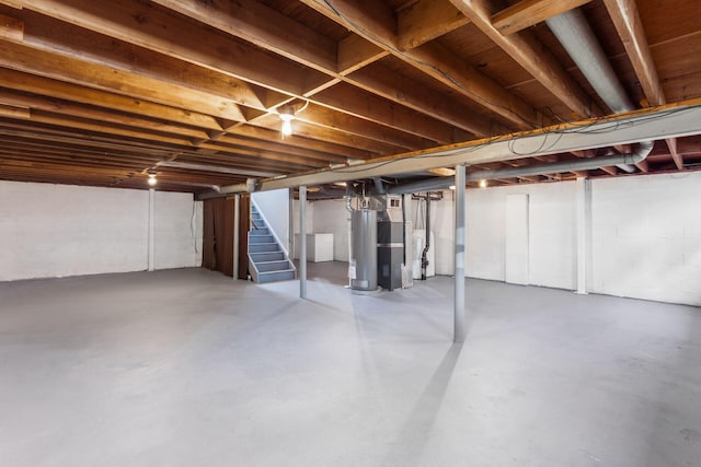 284 Blendon Rd, West Jefferson, OH 43162 - unfinished below grade area with stairs and water heater