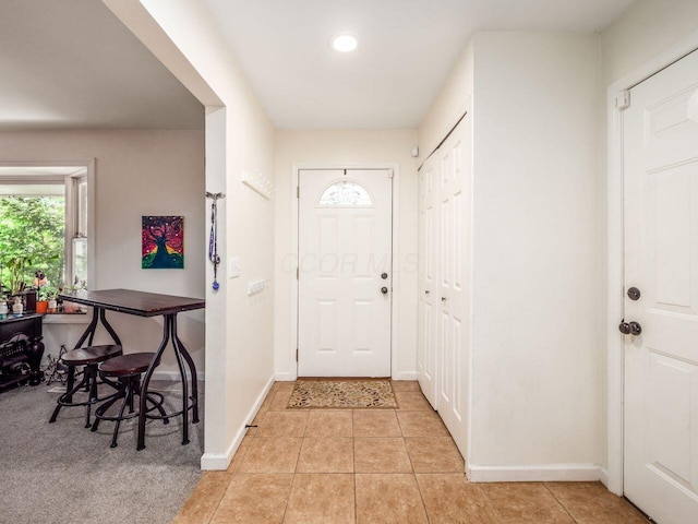 2010 Shallowford Ave, Columbus, OH 43235 - foyer entrance with light tile patterned floors and recessed lighting