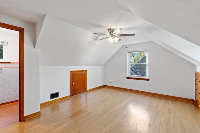 3457 Homecroft Dr, Columbus, OH 43224 - additional living space with light wood-style floors, ceiling fan, and vaulted ceiling
