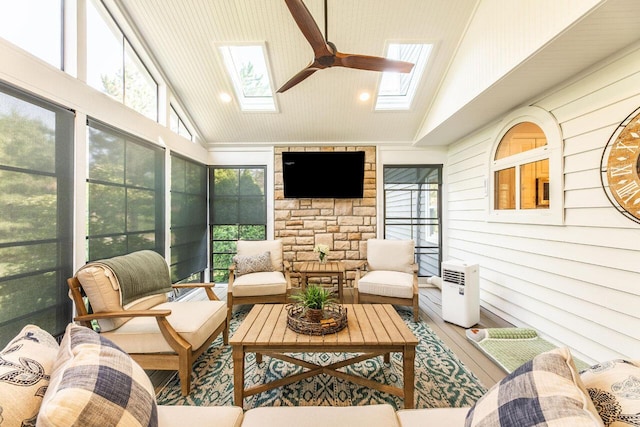 419 Wooten Ct S, Powell, OH 43065 - sunroom / solarium featuring a skylight, ceiling fan, vaulted ceiling, and healthy amount of natural light