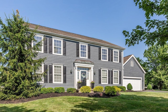 419 Wooten Ct S, Powell, OH 43065 - colonial home with a front yard and an attached garage
